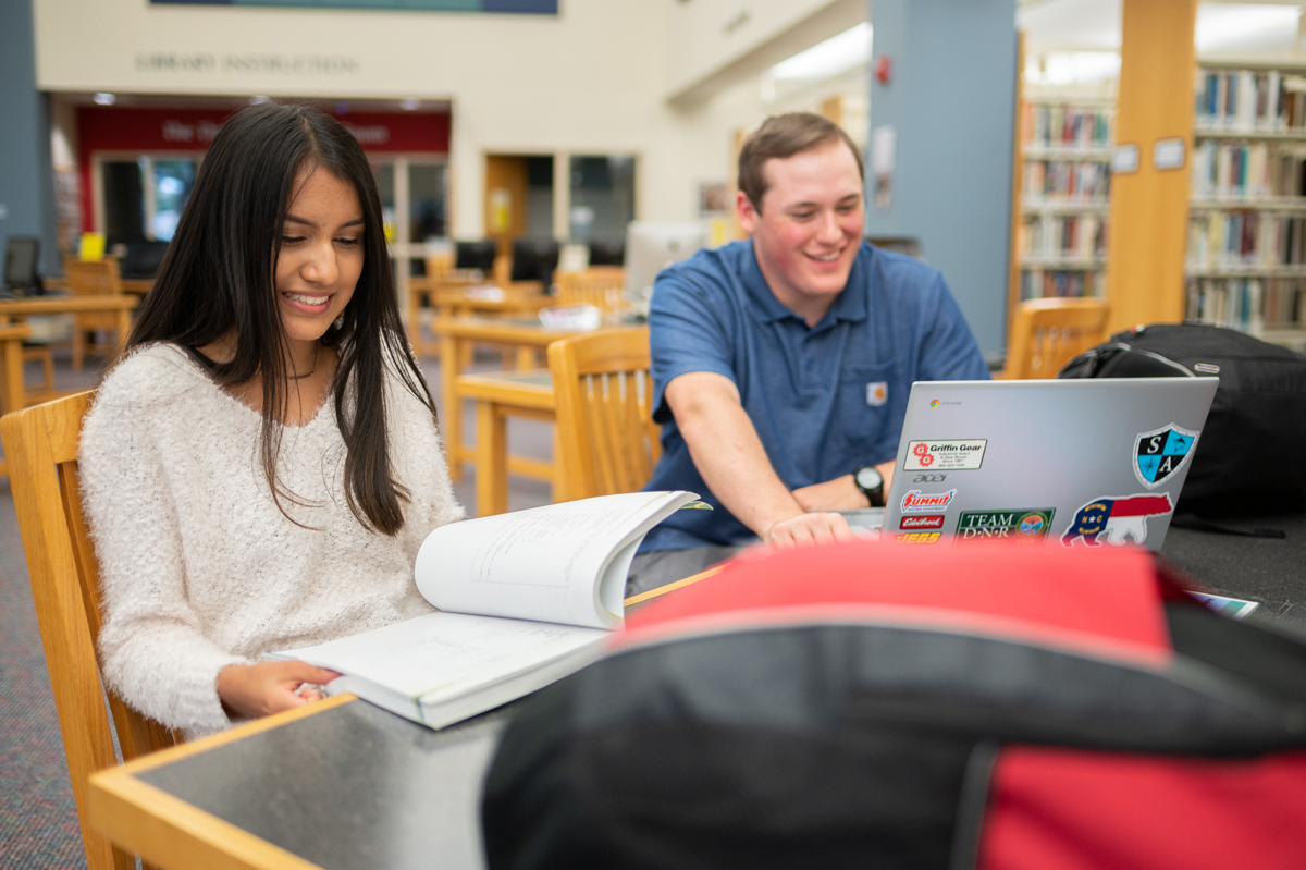 students with laptops