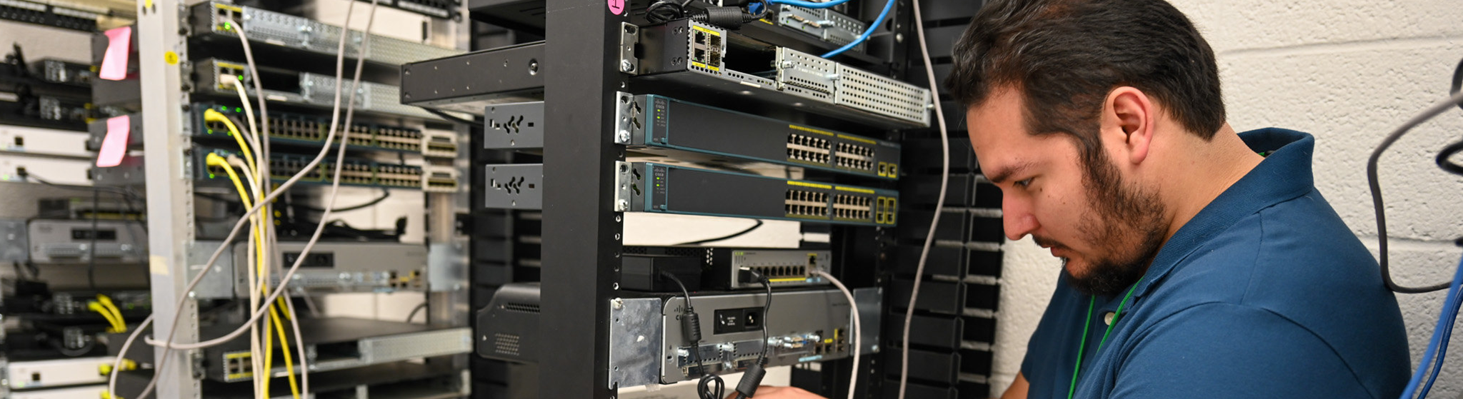Image of student in cyber security classroom