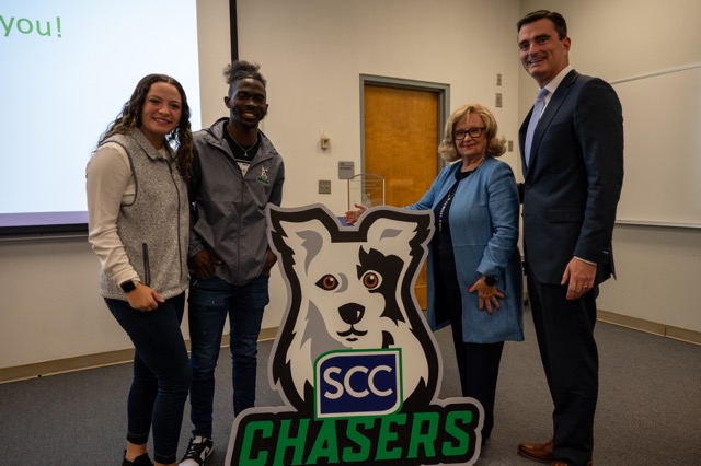 SCC President, Dr. Michael Mikota, stands with Representative Rita Allison and SCC SGA representatives at the 20th Anniversary Celebration of the TLC