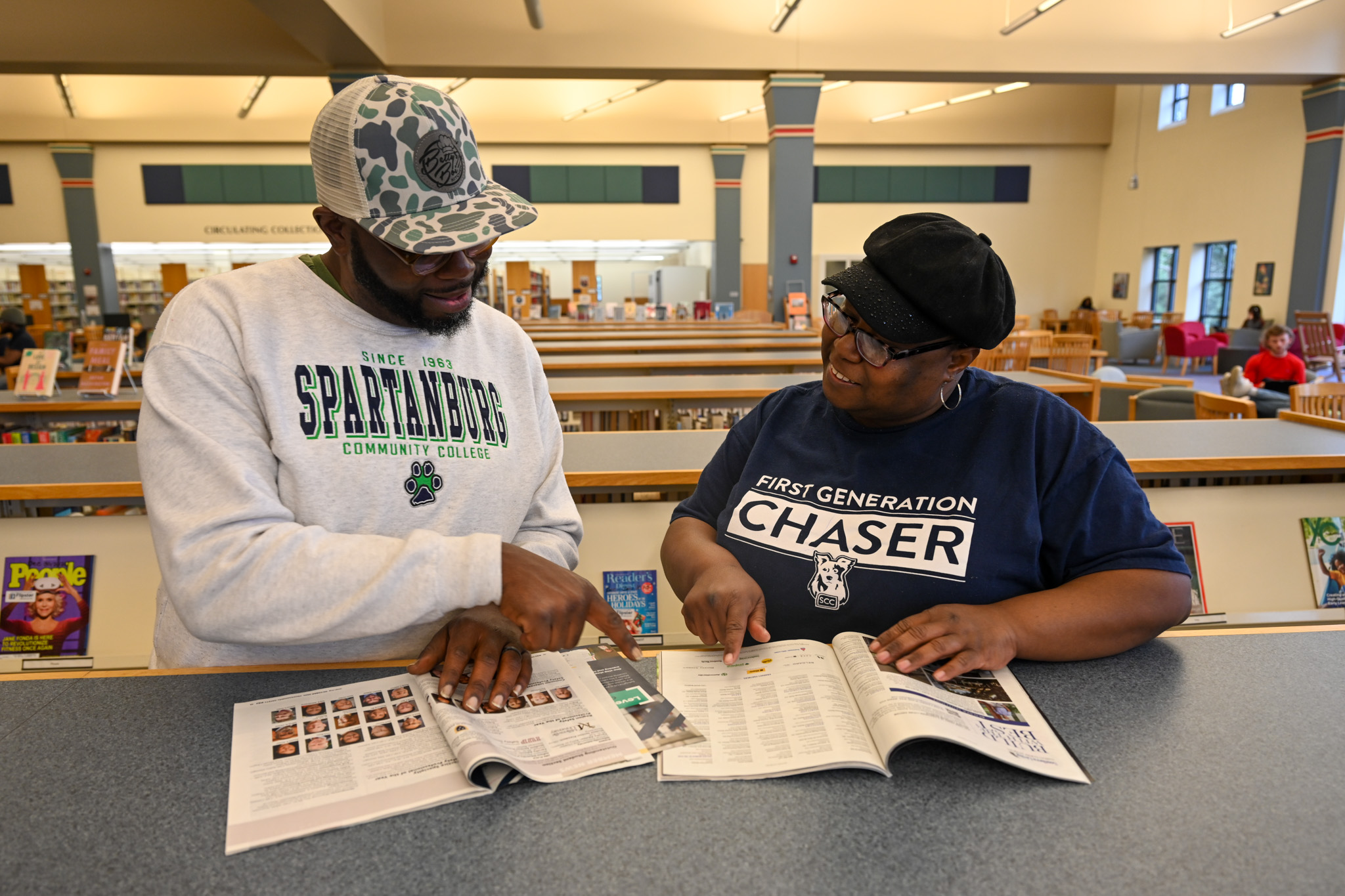 Two SCC students study together in the library