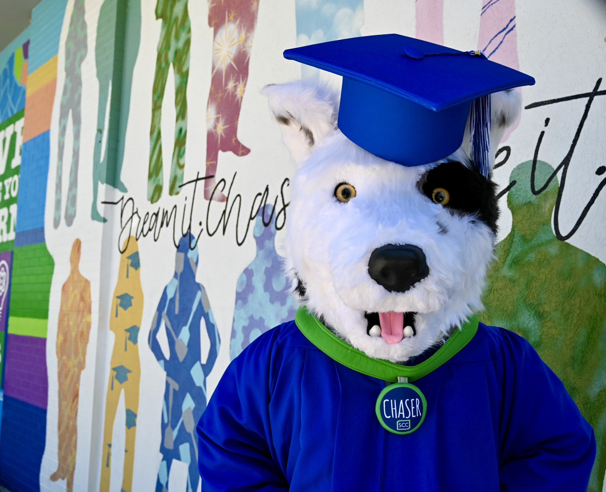 Chaser poses in her graduation get-up